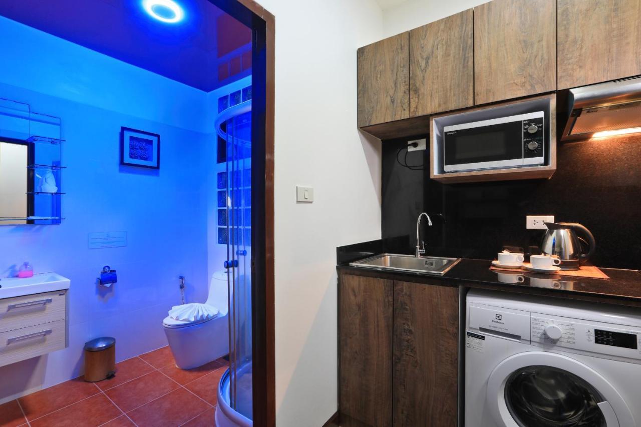 Ferienwohnung Palm Oasis Nai Harn Exterior foto