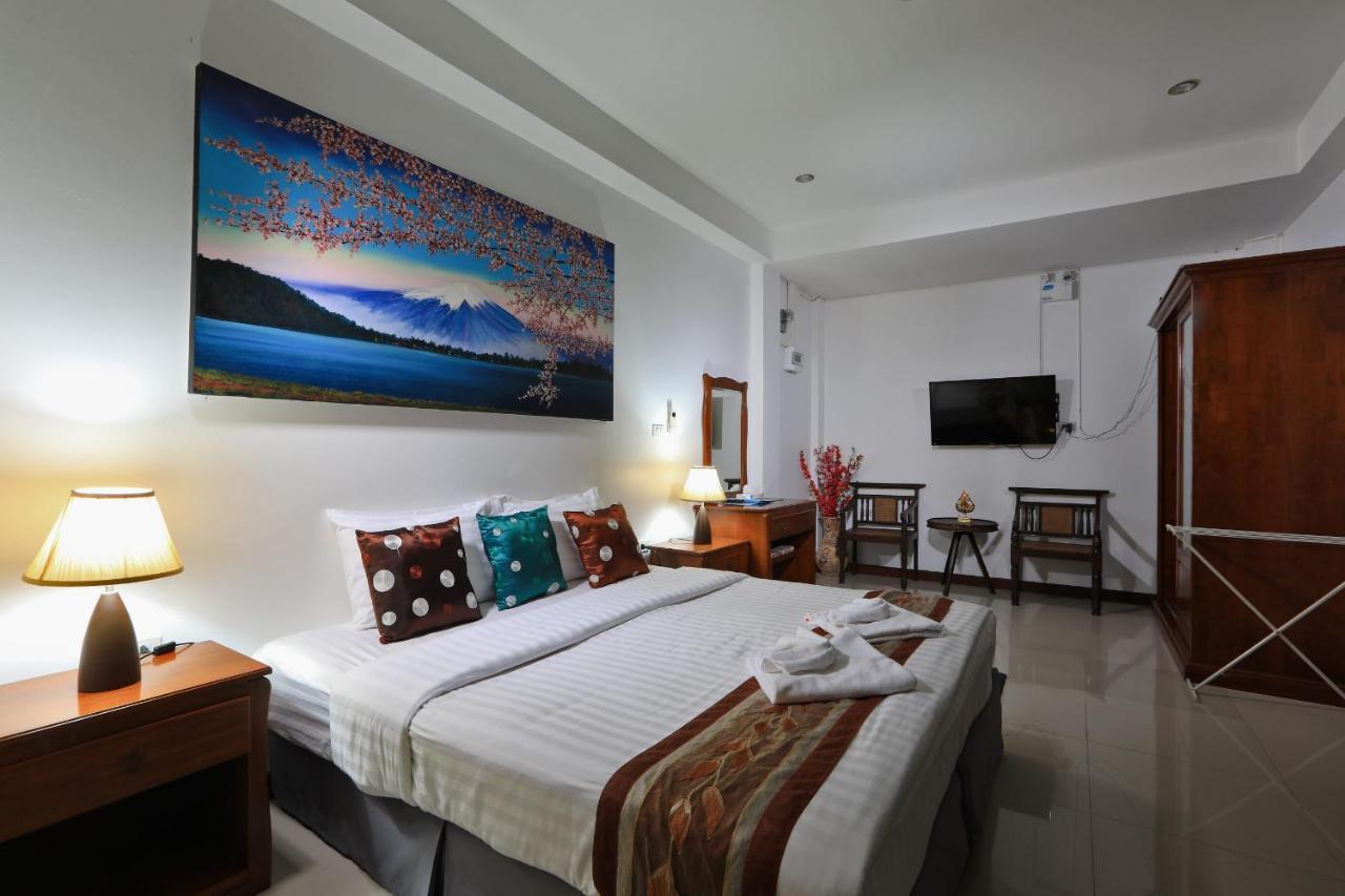 Ferienwohnung Palm Oasis Nai Harn Exterior foto
