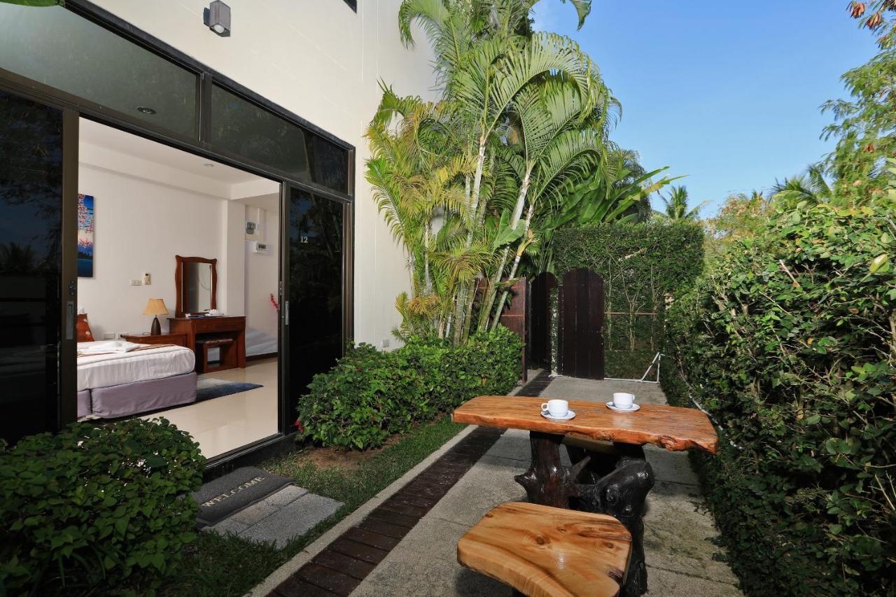 Ferienwohnung Palm Oasis Nai Harn Exterior foto