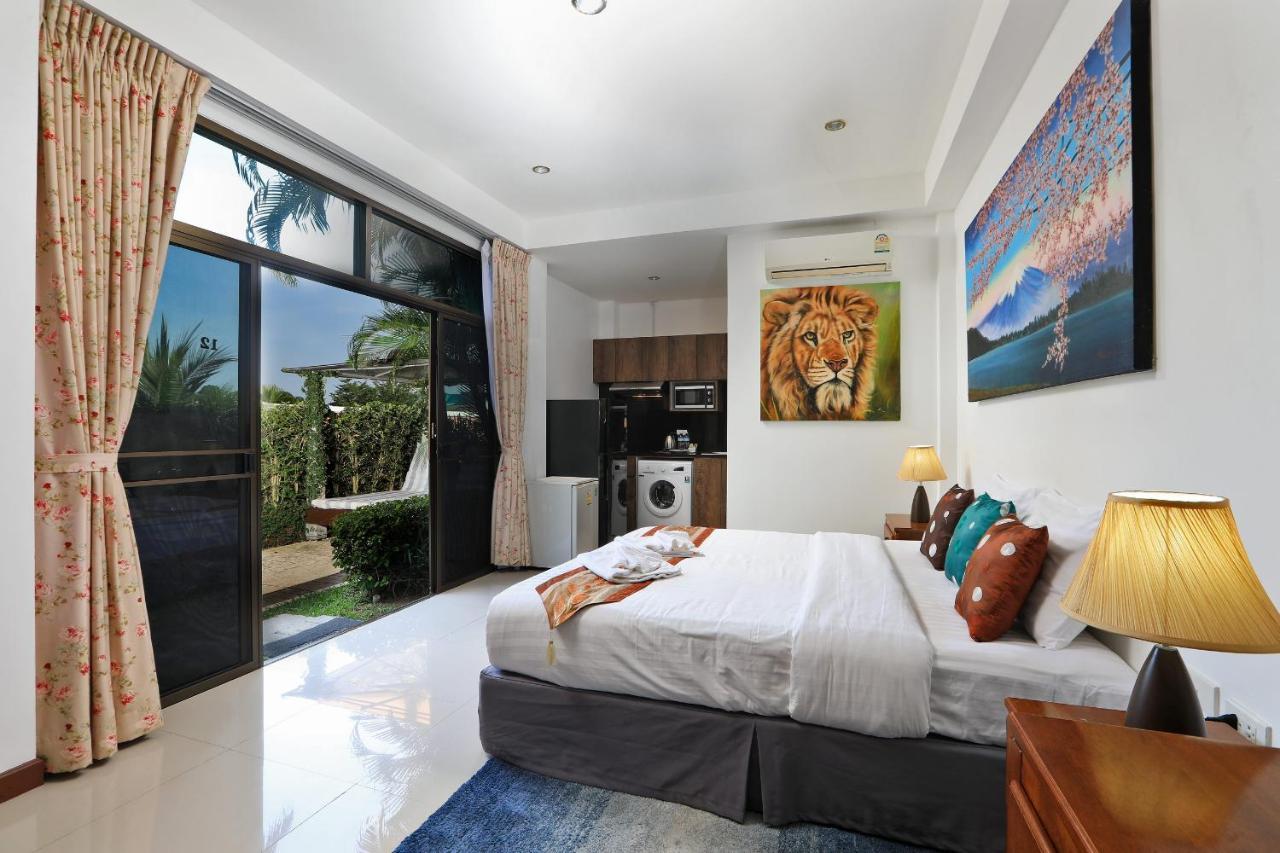 Ferienwohnung Palm Oasis Nai Harn Exterior foto